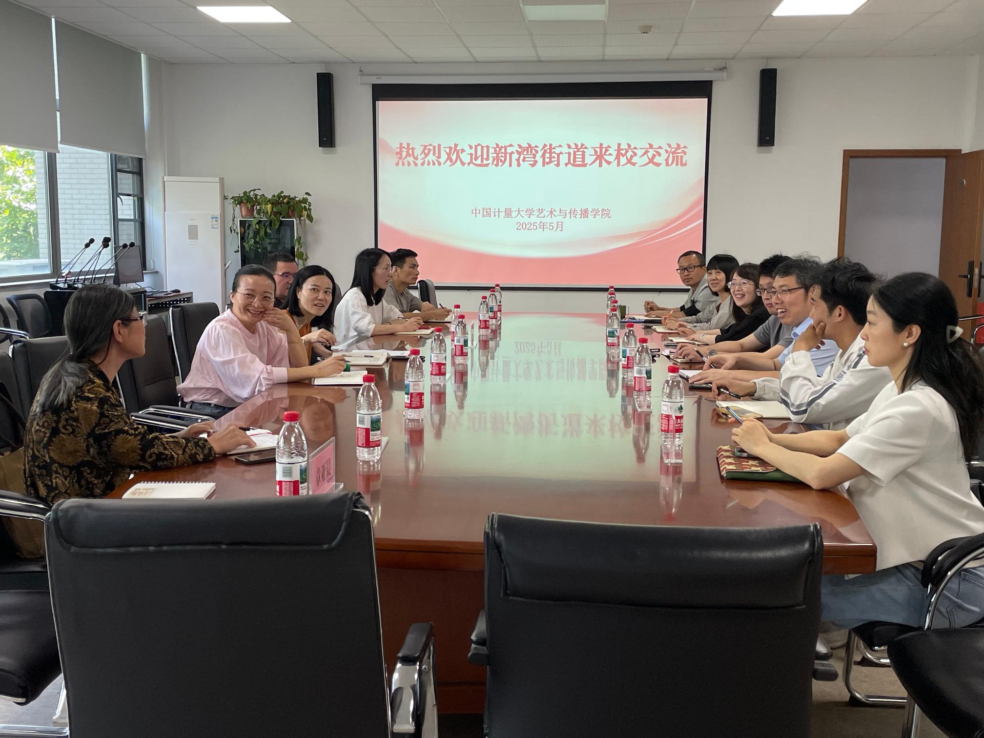 新湾街道来校交流